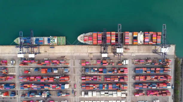 High angle view or Aerial view of Cargo crane container terminal at port , Cargo and shipping logistic