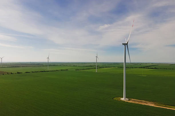 istock Electrical wind power mills, aerial view. 1391969884