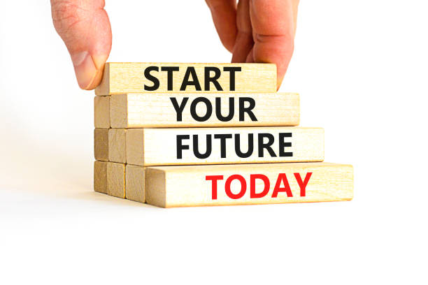 istock Start your future today symbol. Concept words Start your future today on wooden blocks. Businessman hand. Beautiful white table white background. Start your future today business concept. Copy space. 1391970118