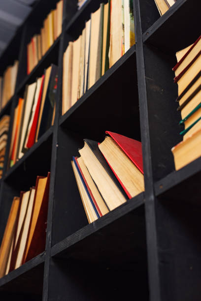 istock many books with yellowed pages lie on a dusty shelf 1391972406