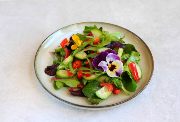 istock Vegetable salad with flowers 1391972753