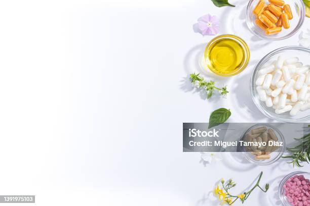 Flat Lay Composition Of Various Vitamin Capsules And Dietary Supplements Isolated On White Background With Copy Space Stock Photo - Download Image Now