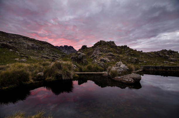 Lake reflection of mountain landscape at sunset Lake reflection of mountain landscape at sunset. Itatiaia National Park. mantiqueira mountains stock pictures, royalty-free photos & images