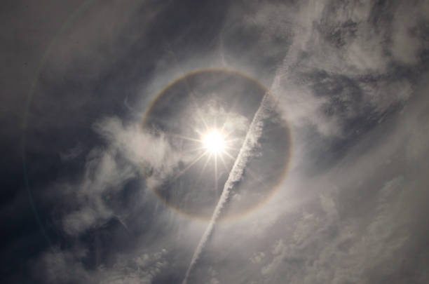 istock Bright solar halo and chemtrail 1391982005
