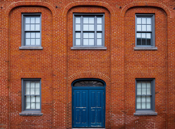 Brick building with a blue entrance door, Musée du Haut-Richelieu, St-Jean-sur-Richelieu, Quebec, Canada
