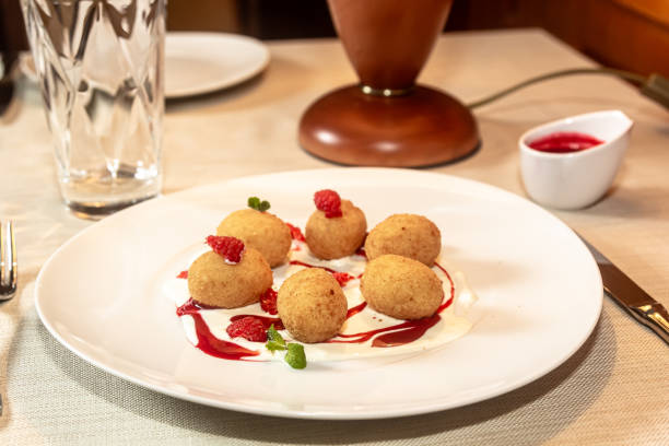 istock Deep fried balls of arborio rice stuffed with mozzarella cheese 1391985301