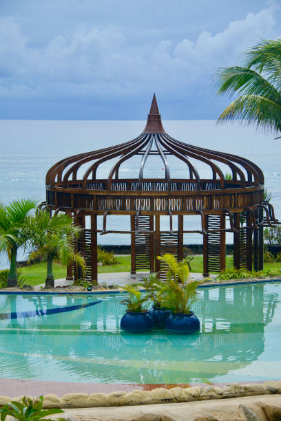swimming pool and coconut tree at seaside in Vietnam