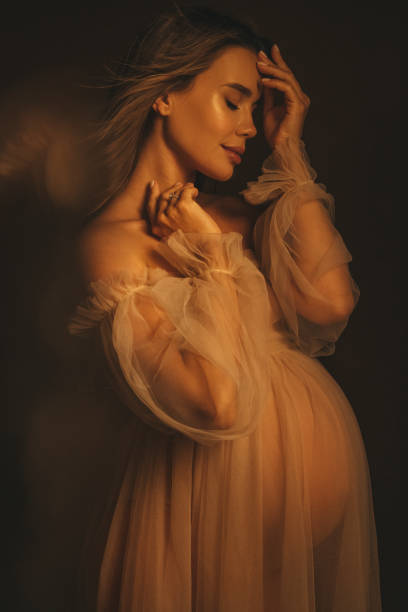 istock Stylish pregnant woman 1391991292