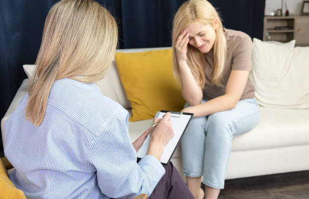 istock Psychologist understanding problems of a woman patient 1391991369