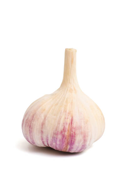 istock Raw whole garlic isolated on white background. Fresh garlic Isolated on white 1391991751