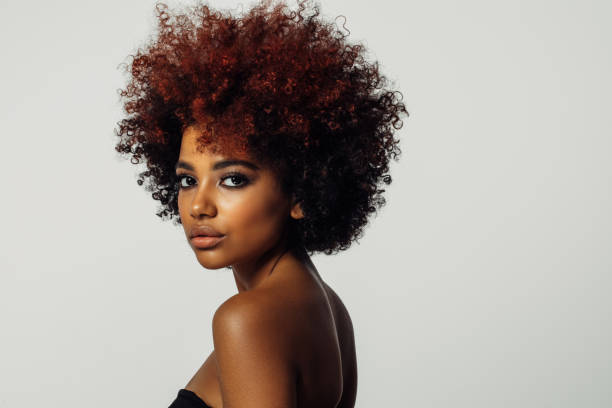 istock Beautiful afro woman with perfect make-up 1391993255