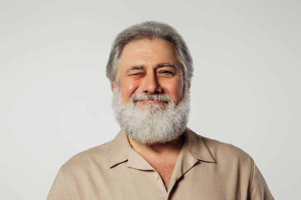 istock Portrait of a real happy old man 1391993334