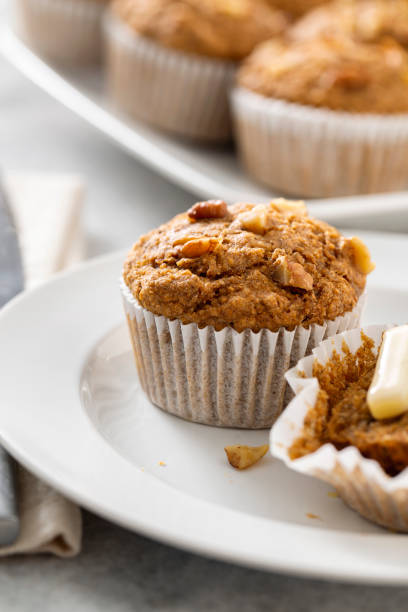istock Whole Grain Banana Walnut Muffin with Melted Butter 1391999047