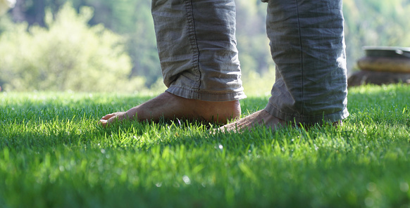 Walking barefoot in the garden.