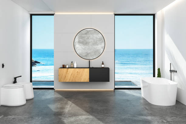 istock Interior of comfortable bathroom with white walls, 1392010578