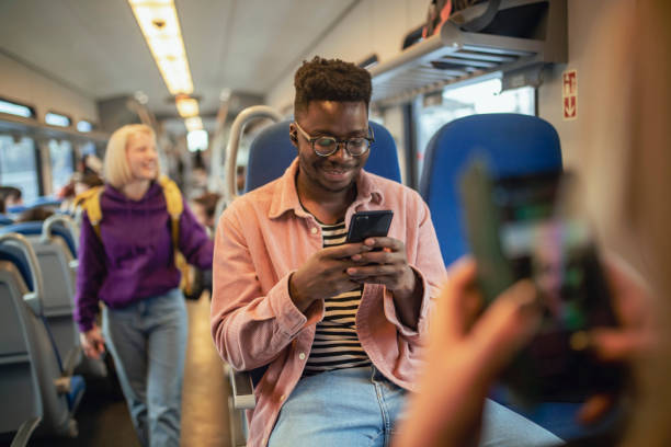 istock The passenger uses a mobile phone while riding the tram. 1392014706