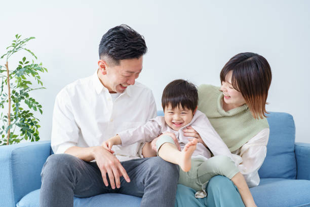 istock Family relaxing on the sofa 1392015635