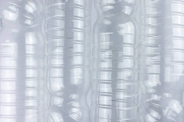 istock Empty transparent plastic bottle on white background. Top view. Pollution, recycling, environmental protection concept. 1392018274