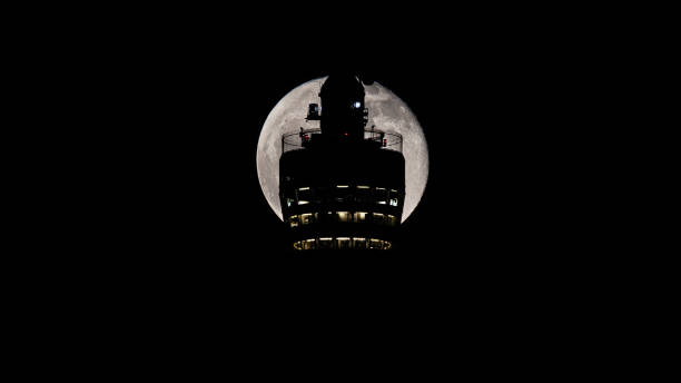 istock Pink full moon behind TV Tower Stuttgart 1392021927