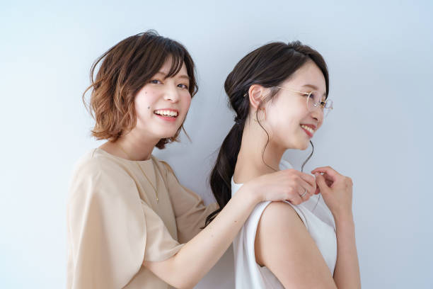 istock Two young women lined up 1392022999