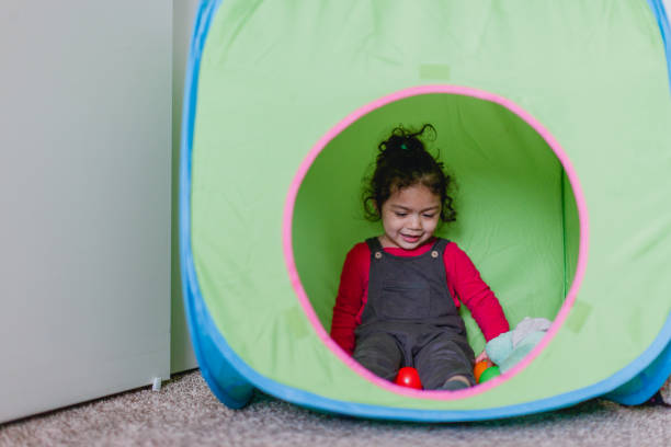 istock Toddler Girl Playing Inside at Home 1392023047