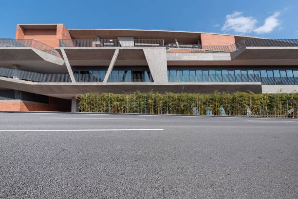istock A low rise modern building on the edge of an empty asphalt road 1392025648