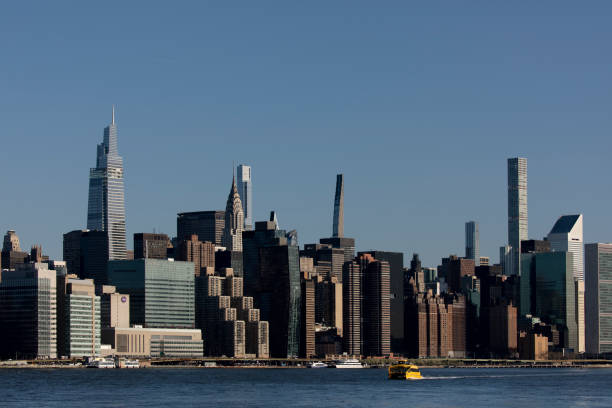 View of midtown Manhattan from East River in New York City.