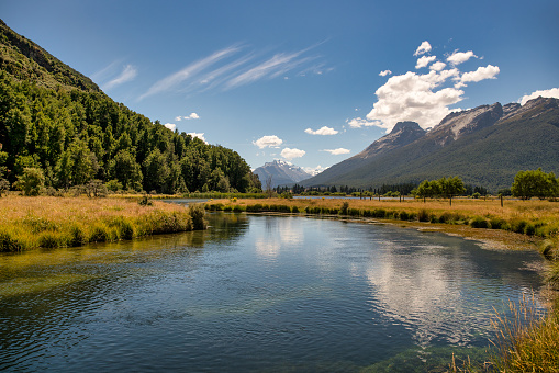 The meandering but swift current in the river at the Diamond Creek walkway near Glenorchy on the walkway to Lake Reid