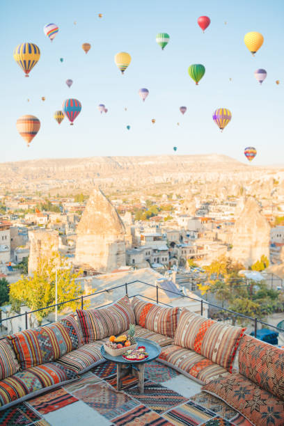 istock Traditional turkish breakfast with fruits with Cappadocia view 1392042439