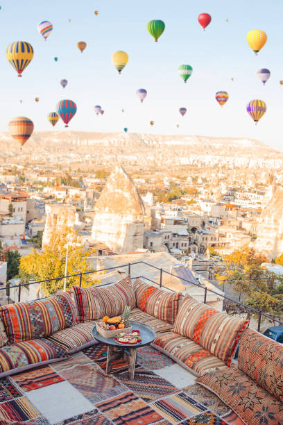 istock Traditional turkish breakfast with fruits with Cappadocia view 1392042492