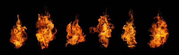 the set of fire and burning flame isolated on dark background for graphic design - yangın stok fotoğraflar ve resimler