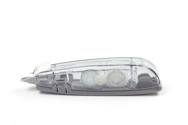 istock Correction tape is school supplies or  office tool isolated on white background. 1392044332