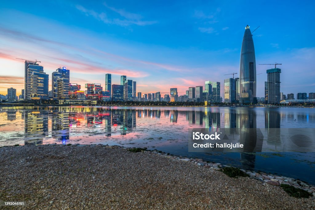 urban skyline and modern buildings at dusk, cityscape of China Shenzhen, China - East Asia, Guangdong Province, Shenzhen Bay Park, Bay of Water China - East Asia Stock Photo