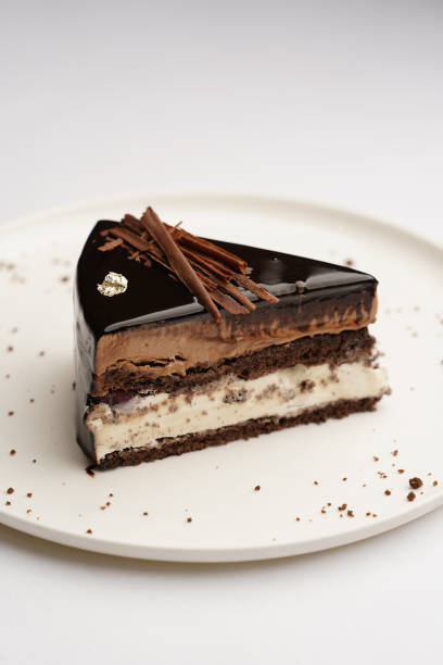 istock Piece of chocolate cheesecake on a white plate 1392047090