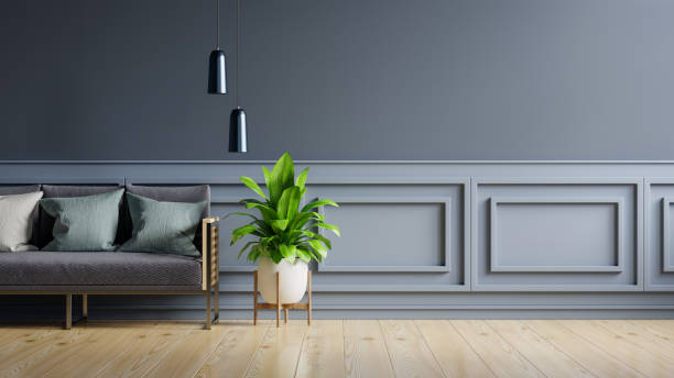 istock Mockup living room interior with sofa on empty dark blue wall background. 1392047762