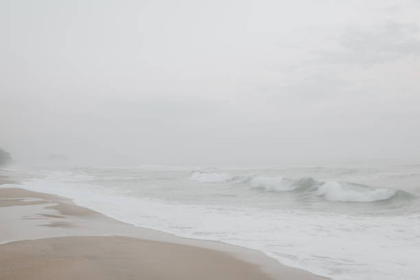 istock sea surf with fog 1392052100
