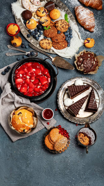 istock Dessert table with all kinds of cakes and snacks. 1392052910