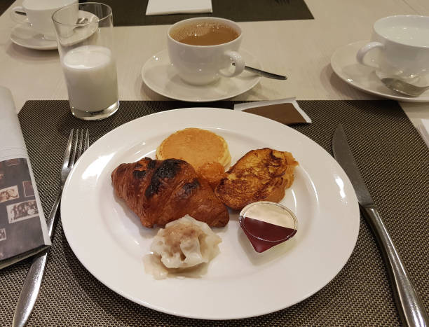 istock Morning Breakfast. Read Newspaper, News and Latest Event Update 1392053894