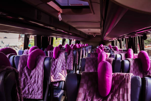 istock Empty bus interior. Public transport in the city. 1392054056