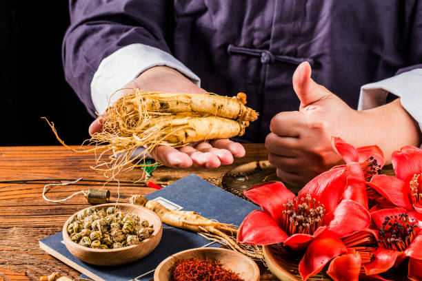 istock A Chinese medicine practitioner is selecting ginseng, traditional Chinese medicine 1392057239