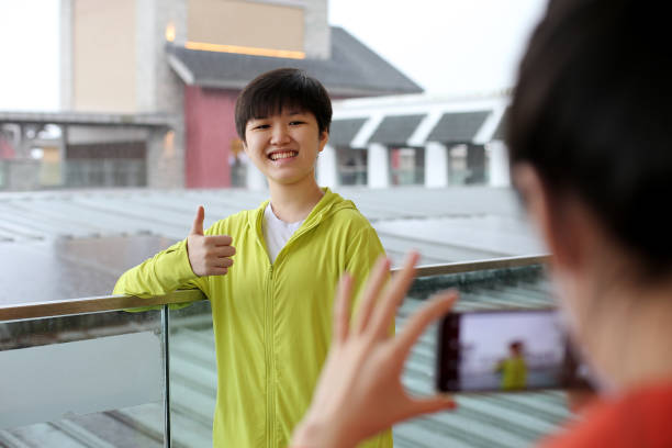 istock Asian Teenage Sisters 1392057337