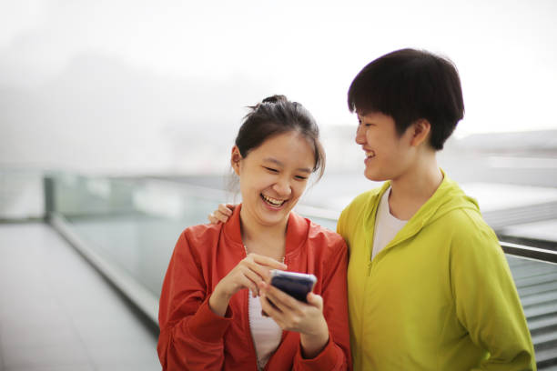 istock Asian Teenage Sisters 1392057368