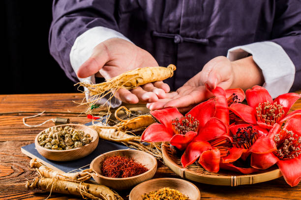 istock A Chinese medicine practitioner is selecting ginseng, traditional Chinese medicine 1392057453