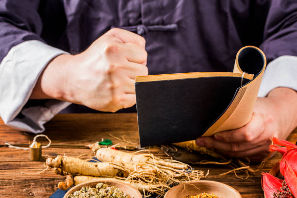 istock A Chinese medicine practitioner is selecting ginseng, traditional Chinese medicine 1392057456