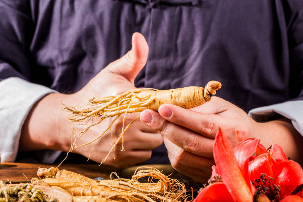 istock A Chinese medicine practitioner is selecting ginseng, traditional Chinese medicine 1392057457