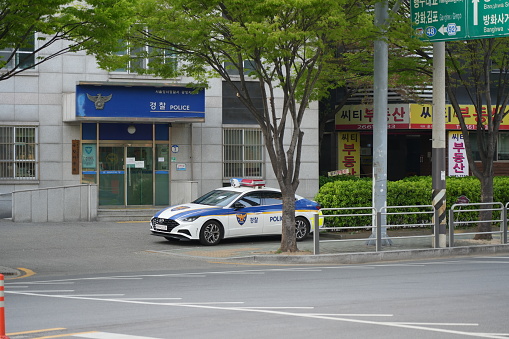 Police Station with Car Parked in Front in Seoul, South Korea