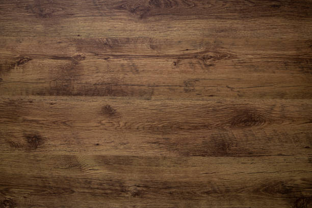 istock Wood texture background with brown swirls 1392061567