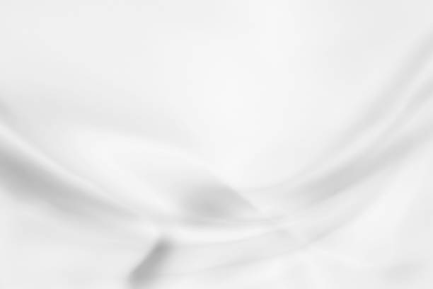 istock Elegant and luxurious white wavy drape background 1392066811