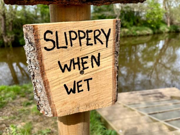 Slippery when wet Slippery when wet greasy water stock pictures, royalty-free photos & images