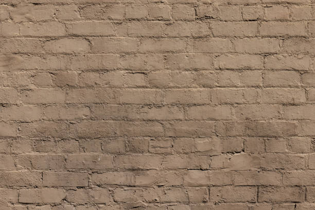 istock Part of a muddy old brick wall 1392067953